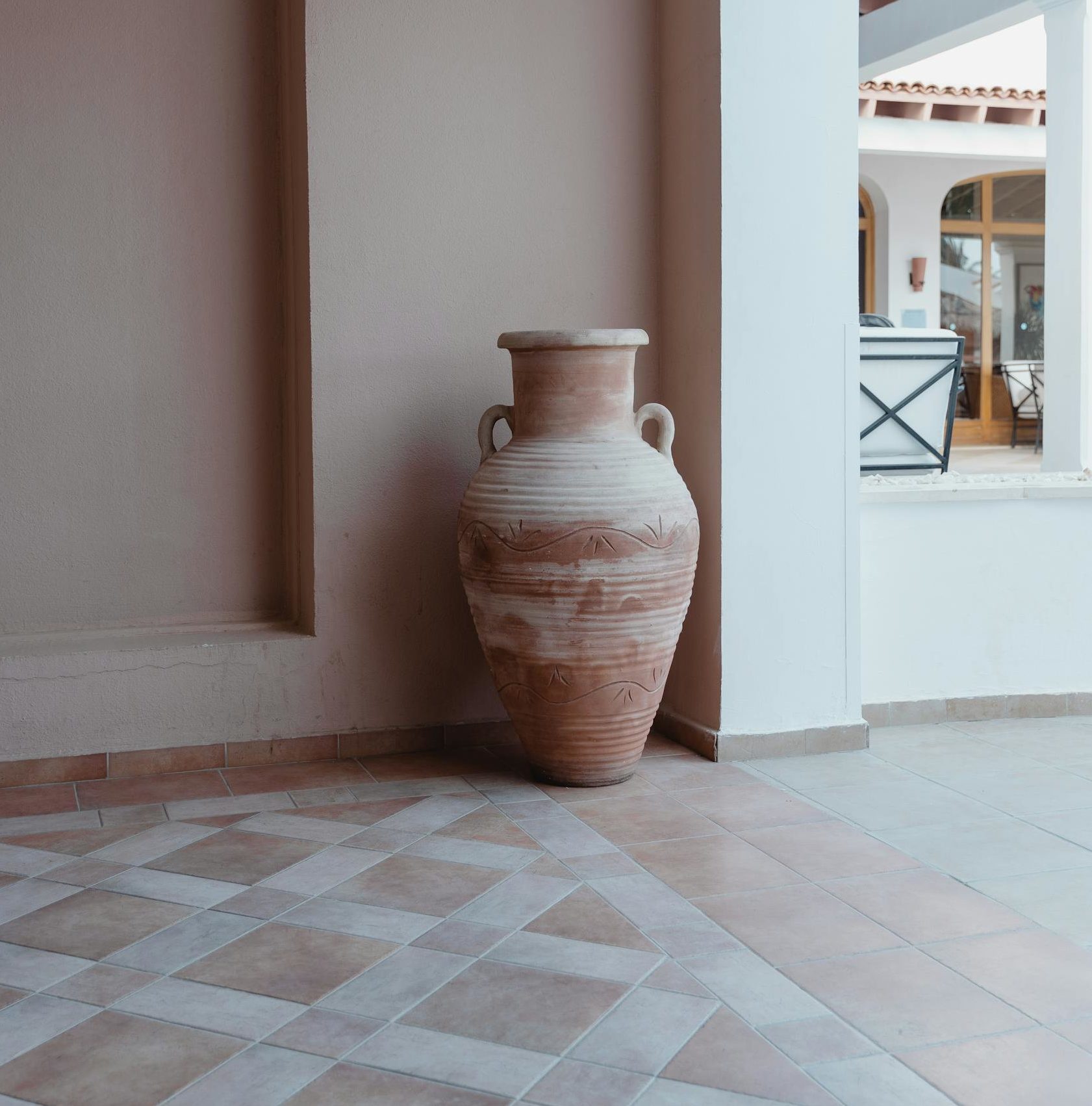 Amphora on Tile Floor